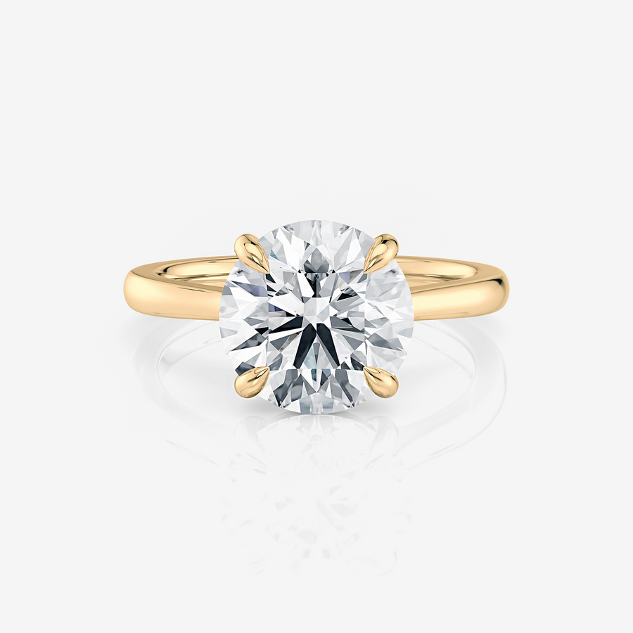 yellow gold Round Tapered Cathedral Solitaire Moissanite Engagement Ring South Africa Moissanite By Design
