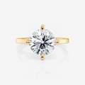 Round Solitaire Four-Claw Moissanite Engagement Ring