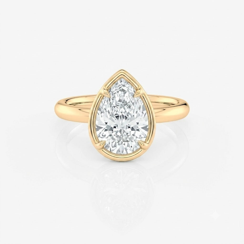 Pear Bezel Solitaire Moissanite Engagement Ring 9ct yellow gold South Africa
